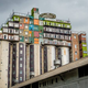 Illustration for article titled This Shipping Container City Above an Old Grain Silo Is Actually a Dorm